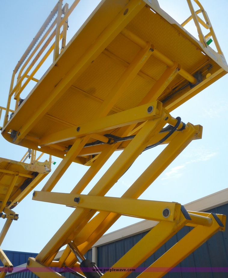 image for item 5072 2002 Haulotte 2668RT compact scissor lift