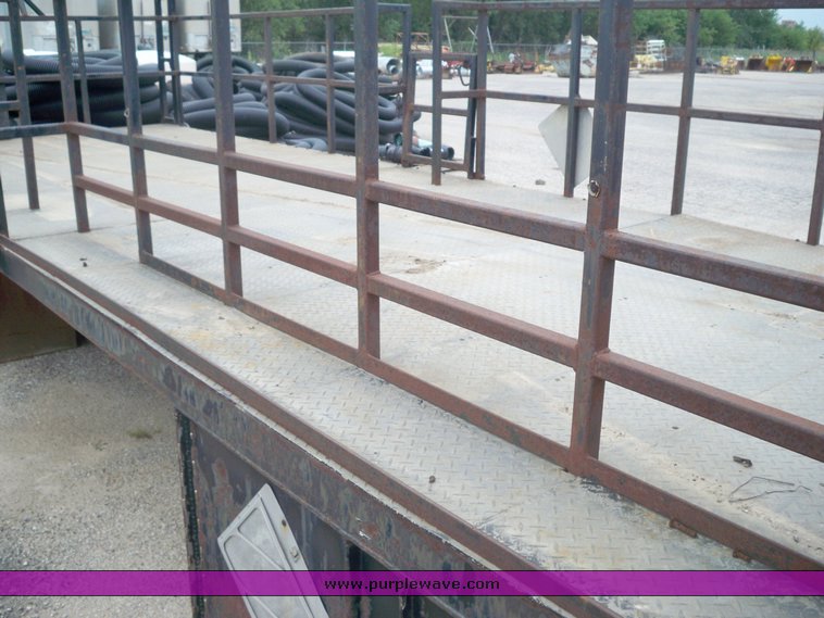 image for item 6953 Steel flat bed with Walt Co. hydraulic lift