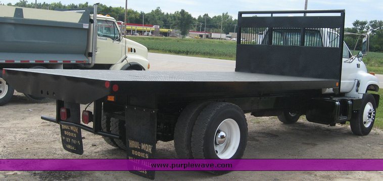 image for item 8631 1998 GMC C-Series C7500 truck with 17' flat bed and Obeco hoist