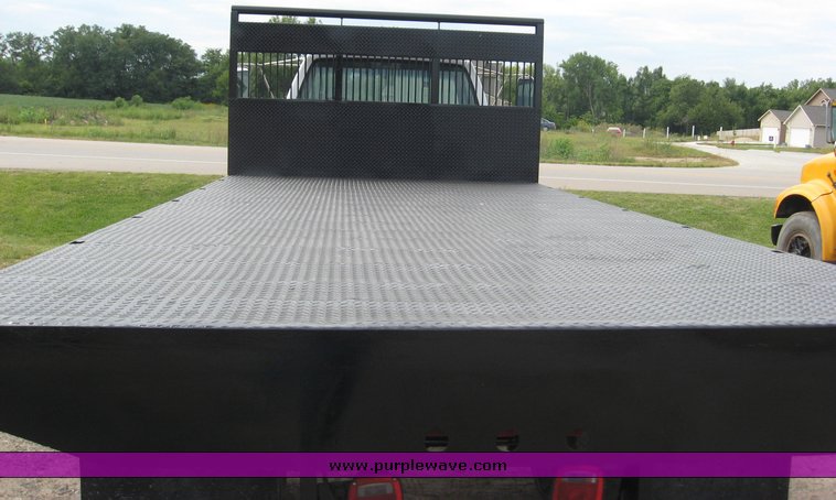 image for item 8631 1998 GMC C-Series C7500 truck with 17' flat bed and Obeco hoist