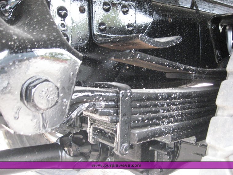 image for item 8631 1998 GMC C-Series C7500 truck with 17' flat bed and Obeco hoist