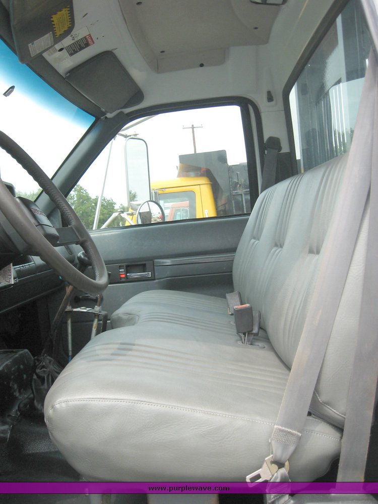 image for item 8631 1998 GMC C-Series C7500 truck with 17' flat bed and Obeco hoist