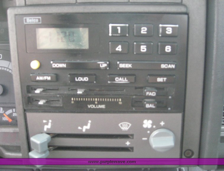 image for item 8631 1998 GMC C-Series C7500 truck with 17' flat bed and Obeco hoist