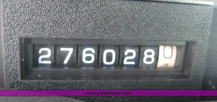 image for item 8631 1998 GMC C-Series C7500 truck with 17' flat bed and Obeco hoist