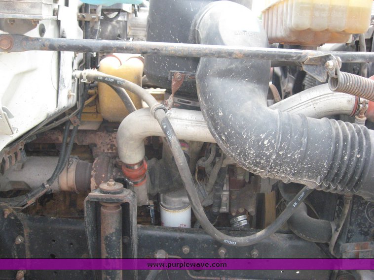 image for item 8631 1998 GMC C-Series C7500 truck with 17' flat bed and Obeco hoist