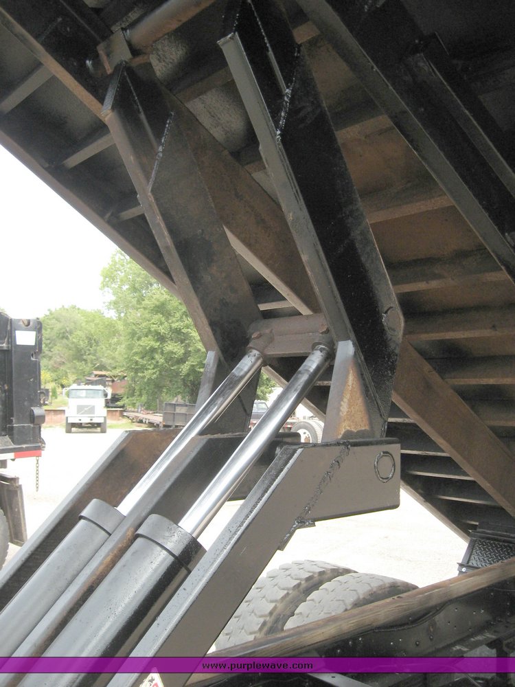 image for item 8631 1998 GMC C-Series C7500 truck with 17' flat bed and Obeco hoist