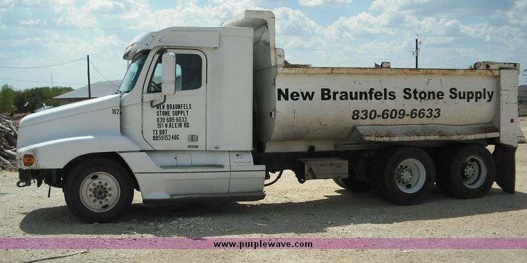 image for item 2296 2000 Freightliner Conventional FLC120 truck with Workhorse steel half round dump bed