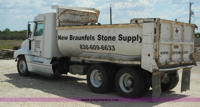 image for item 2296 2000 Freightliner Conventional FLC120 truck with Workhorse steel half round dump bed