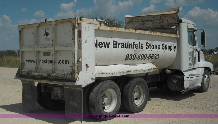 image for item 2296 2000 Freightliner Conventional FLC120 truck with Workhorse steel half round dump bed