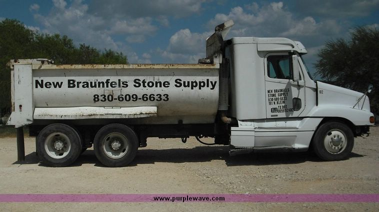 image for item 2296 2000 Freightliner Conventional FLC120 truck with Workhorse steel half round dump bed