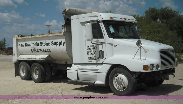 image for item 2296 2000 Freightliner Conventional FLC120 truck with Workhorse steel half round dump bed