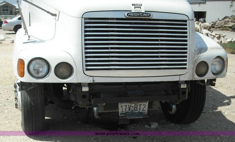 image for item 2296 2000 Freightliner Conventional FLC120 truck with Workhorse steel half round dump bed