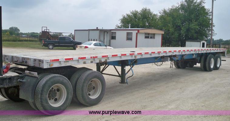 image for item 6946 1999 Wilson 48'L x 96"W steel/aluminuum combo flatbed trailer
