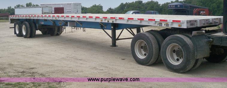 image for item 6946 1999 Wilson 48'L x 96"W steel/aluminuum combo flatbed trailer