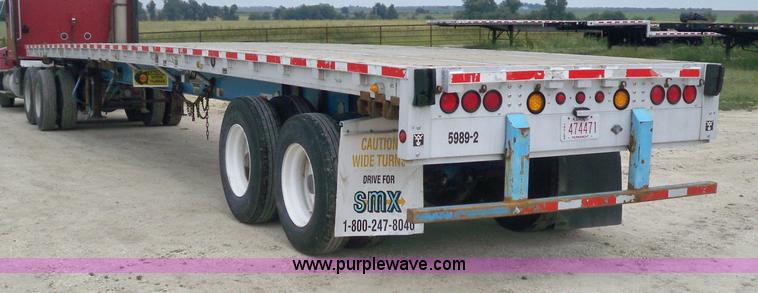 image for item 6946 1999 Wilson 48'L x 96"W steel/aluminuum combo flatbed trailer