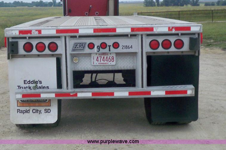 image for item 6950 1997 East 48'L x 96"W aluminum spread axle flatbed trailer