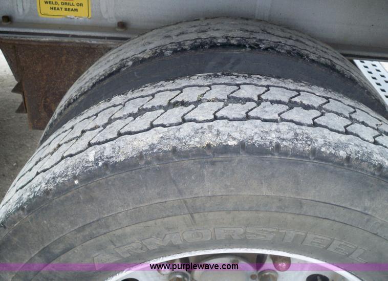 image for item 6950 1997 East 48'L x 96"W aluminum spread axle flatbed trailer