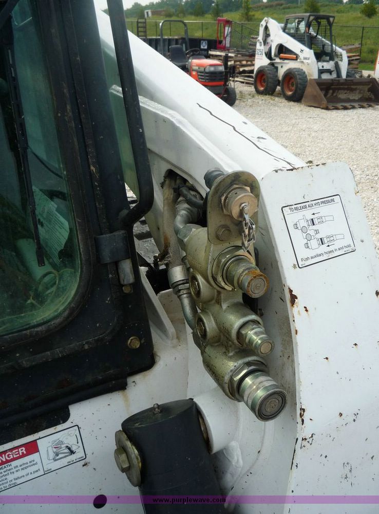 image for item 2055 2005 Bobcat T300 skid steer