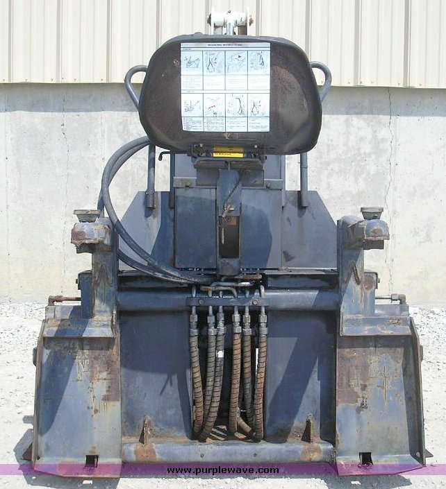 image for item 8008 Bobcat 909 backhoe attachment