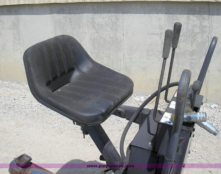 image for item 8008 Bobcat 909 backhoe attachment