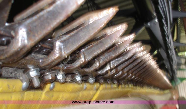 image for item 1300 1997 John Deere 925 flex platform with finger reel