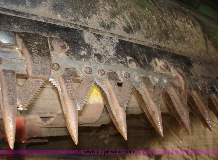 image for item 1300 1997 John Deere 925 flex platform with finger reel