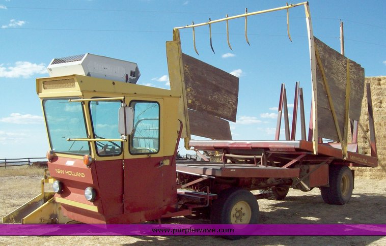image for item 1601 New Holland 1049 super balewagon