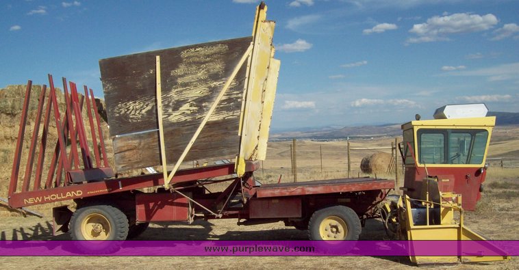 image for item 1601 New Holland 1049 super balewagon