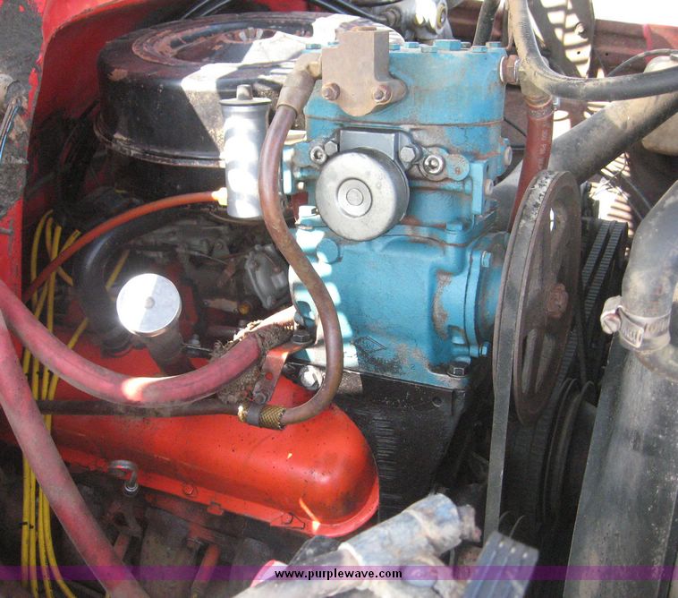 image for item 8636 1973 Chevrolet C65 tandem axle truck with Knapheide 20' grain bed and hoist