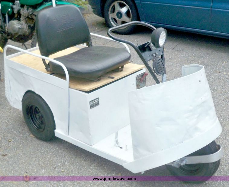 image for item 5159 Taylor-Dunn three wheel electric scooter