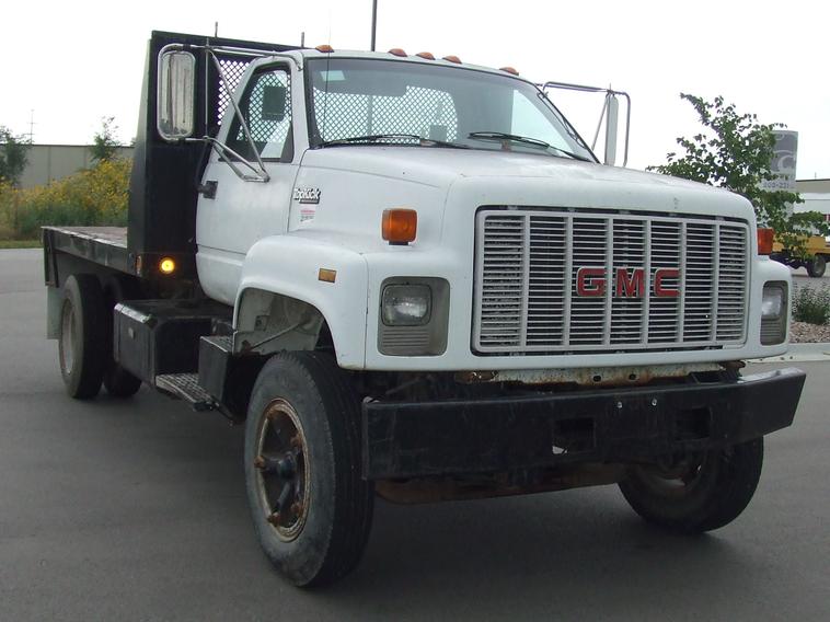 image for item 6009 1991 GMC Topkick C7H042 flat bed truck