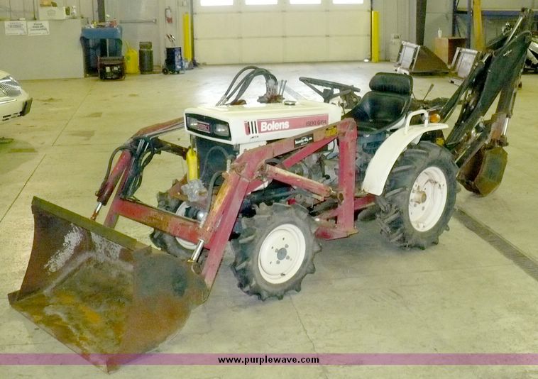 Bolens G154 utility tractor with loader and backhoe in Lee