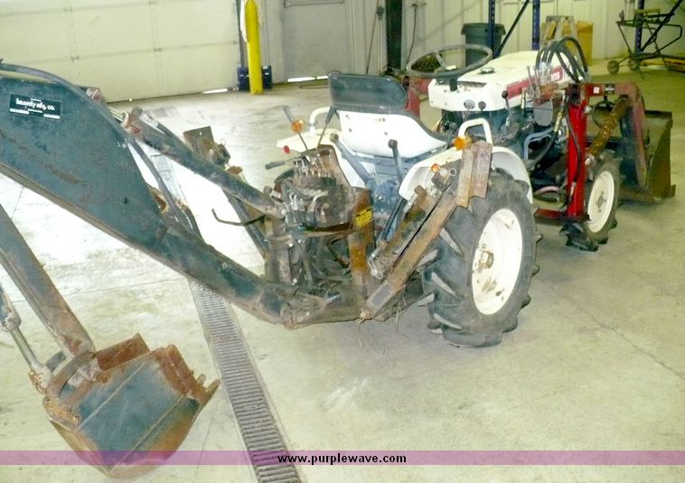 Bolens G154 utility tractor with loader and backhoe in Lee