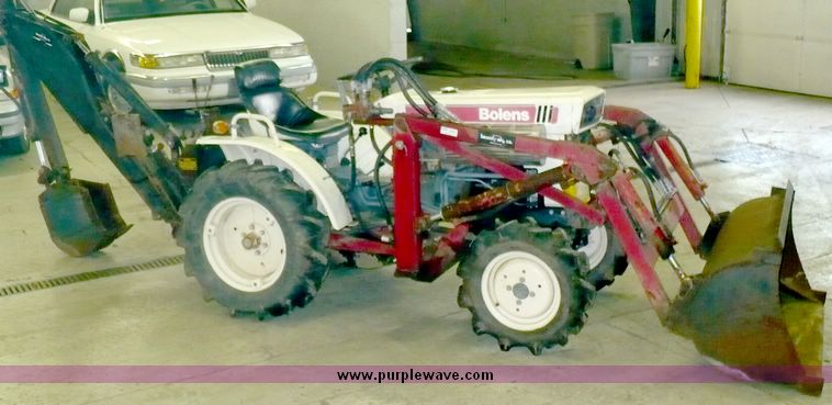 image for item 8561 Bolens G154 utility tractor with loader and backhoe