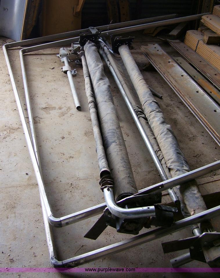 image for item 8795 (2) dump truck bed tarps