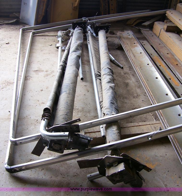 image for item 8795 (2) dump truck bed tarps