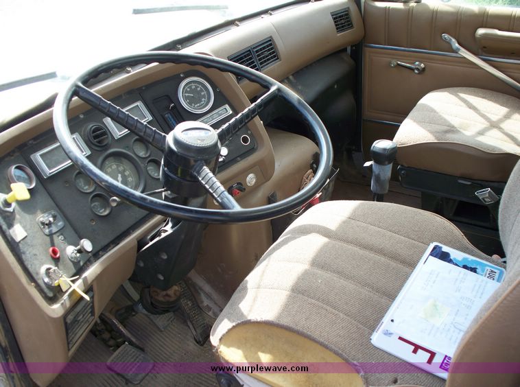 image for item 1103 1994 Ford L800 triple axle truck with Ledwell six bin feed delivery body