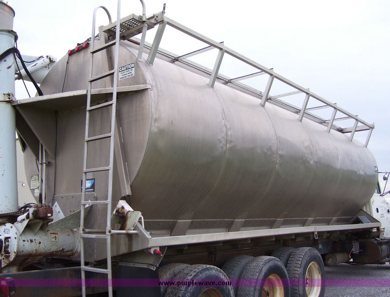 image for item 1107 1996 Ford LNT8000F triple axle food delivery truck with warren six bin feed body