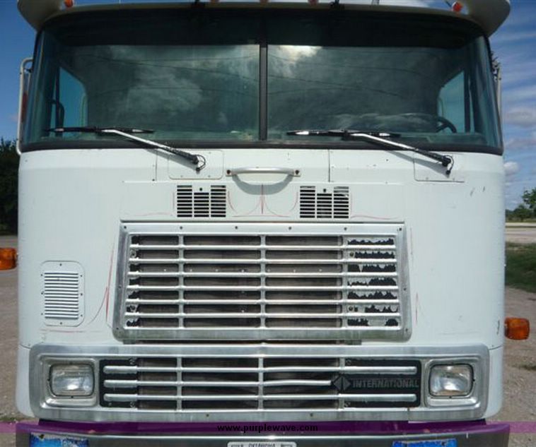 image for item 1110 1993 International 9000 Series 9600 triple axle cab over truck with steel six bin feed delivery body