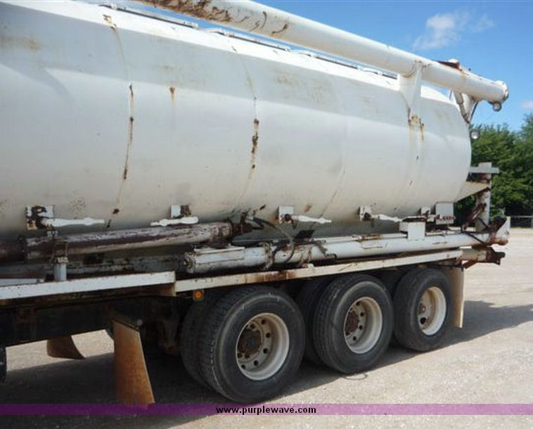 image for item 1110 1993 International 9000 Series 9600 triple axle cab over truck with steel six bin feed delivery body