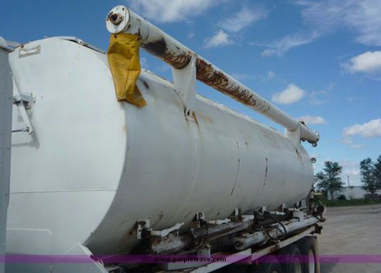 image for item 1110 1993 International 9000 Series 9600 triple axle cab over truck with steel six bin feed delivery body