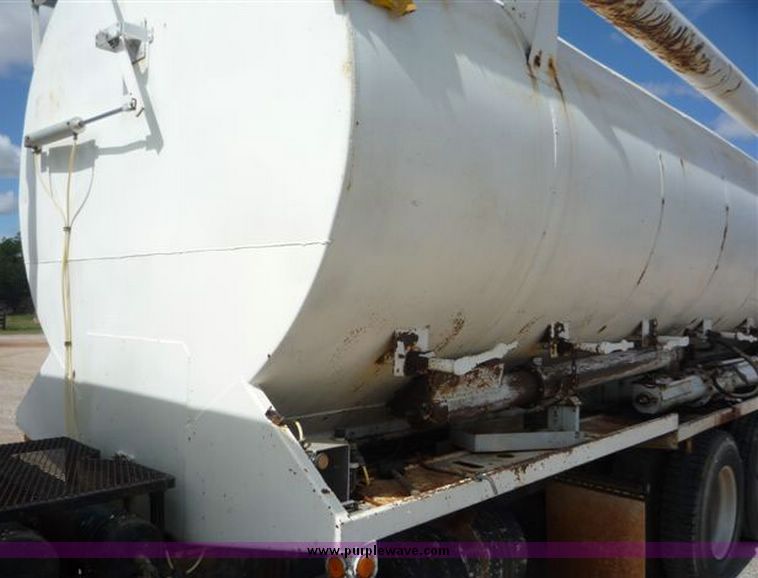 image for item 1110 1993 International 9000 Series 9600 triple axle cab over truck with steel six bin feed delivery body