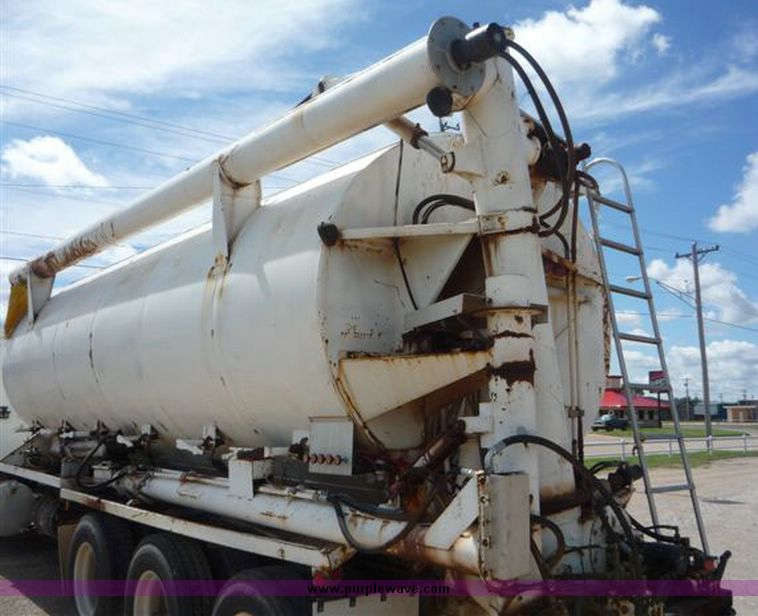 image for item 1110 1993 International 9000 Series 9600 triple axle cab over truck with steel six bin feed delivery body