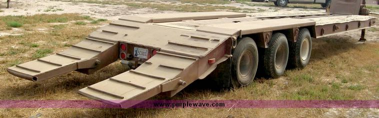 image for item 8683 1981 Bush Hog Landcraft 32' flatbed trailer