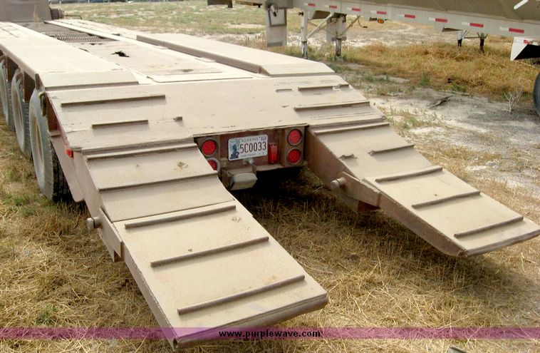 image for item 8683 1981 Bush Hog Landcraft 32' flatbed trailer
