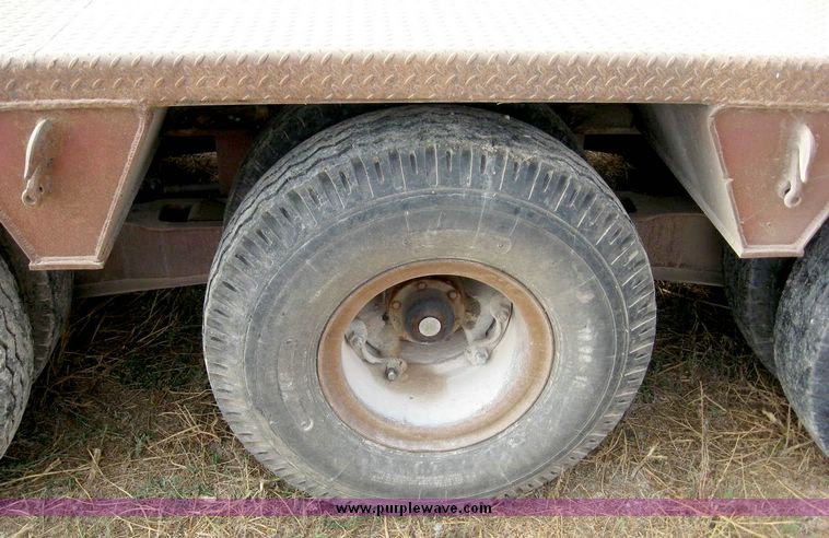 image for item 8683 1981 Bush Hog Landcraft 32' flatbed trailer