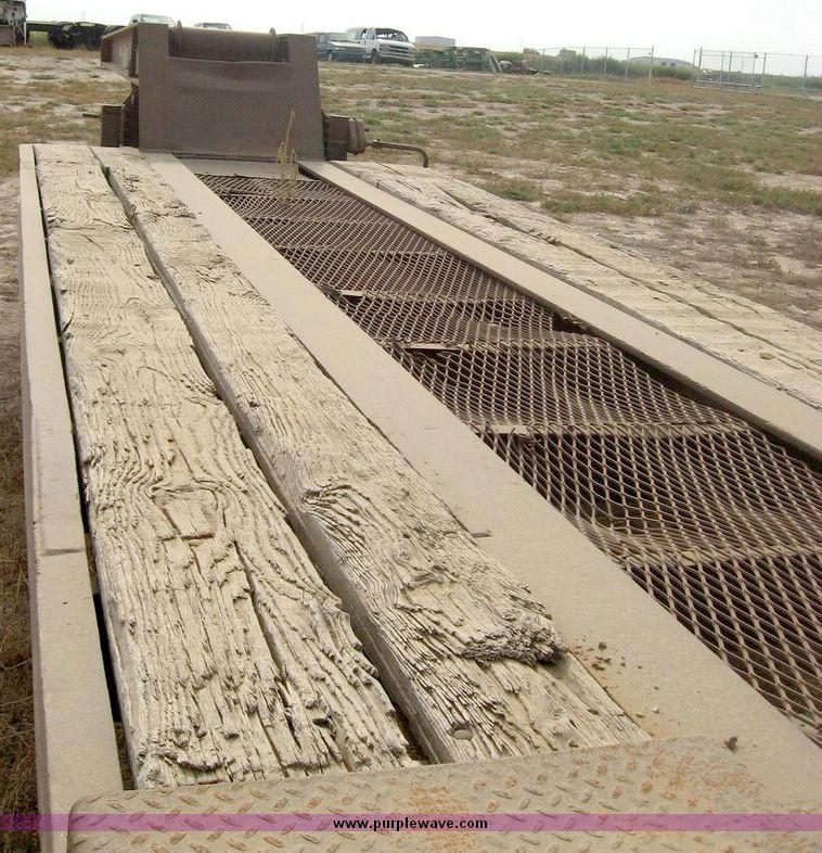 image for item 8683 1981 Bush Hog Landcraft 32' flatbed trailer