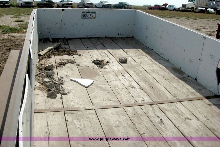 image for item 8687 16' flatbed trailer with 24" sides