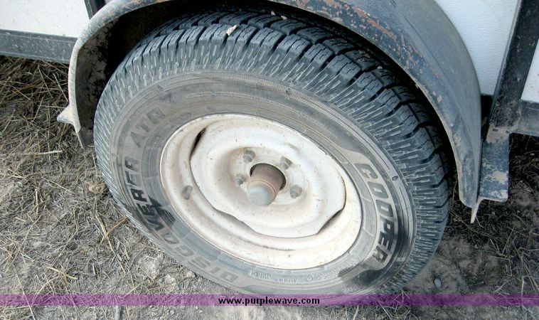 image for item 8694 10' utility trailer with tilt bed