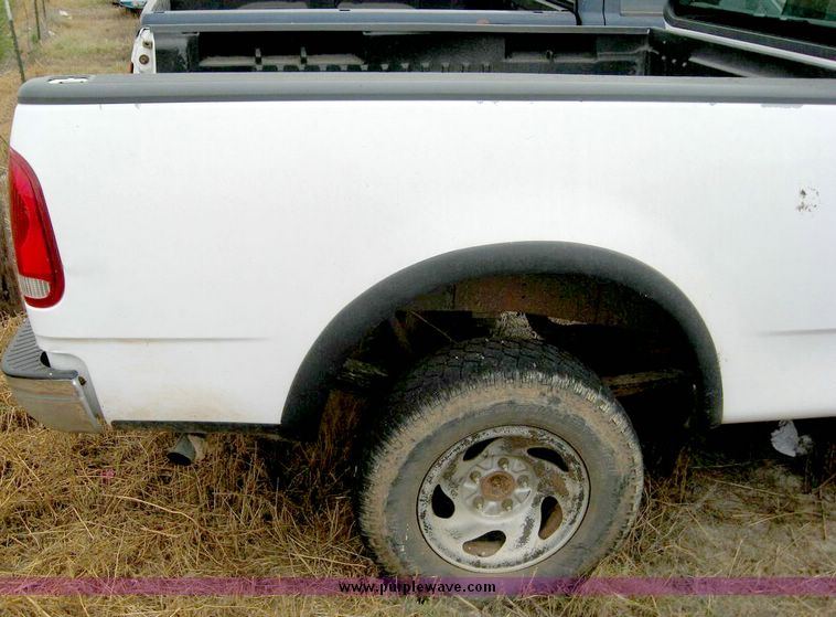 image for item 8707 1999 Ford F150 extended cab pickup truck